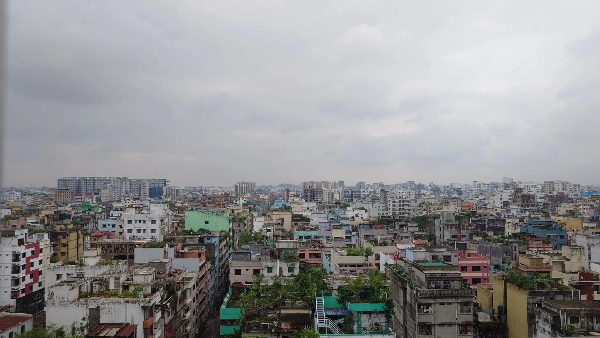 A dense Dhaka city skyline, representing how small businesses in Bangladesh can adopt affordable AI in 2026